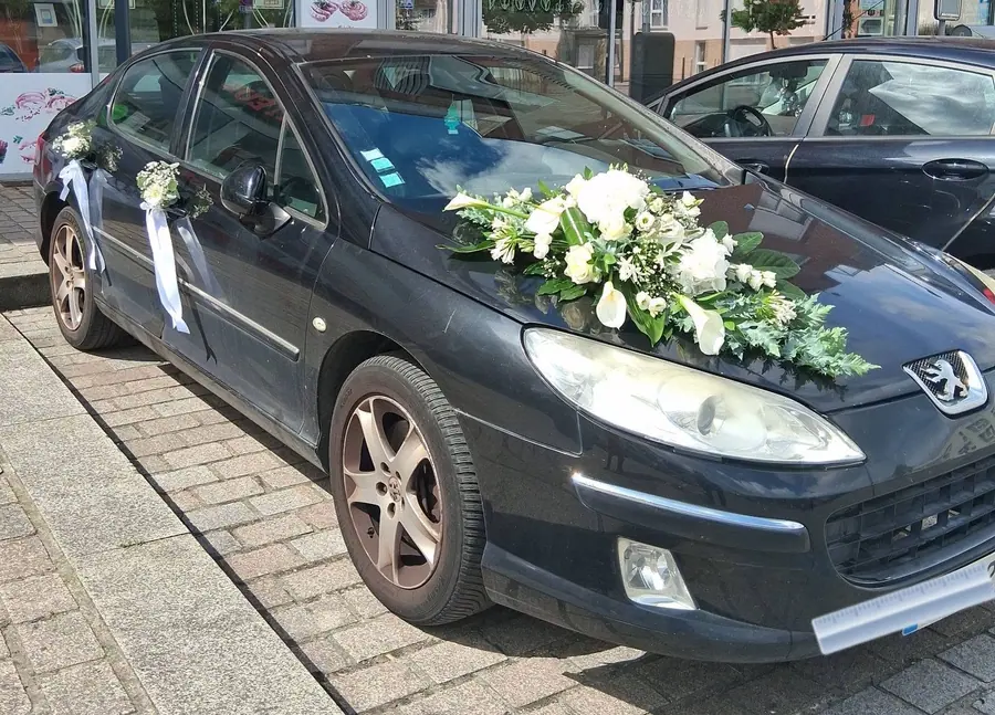 Décoration florale de mariage réalisée par MC Maison des Créations, fleuriste à Beuvrages
