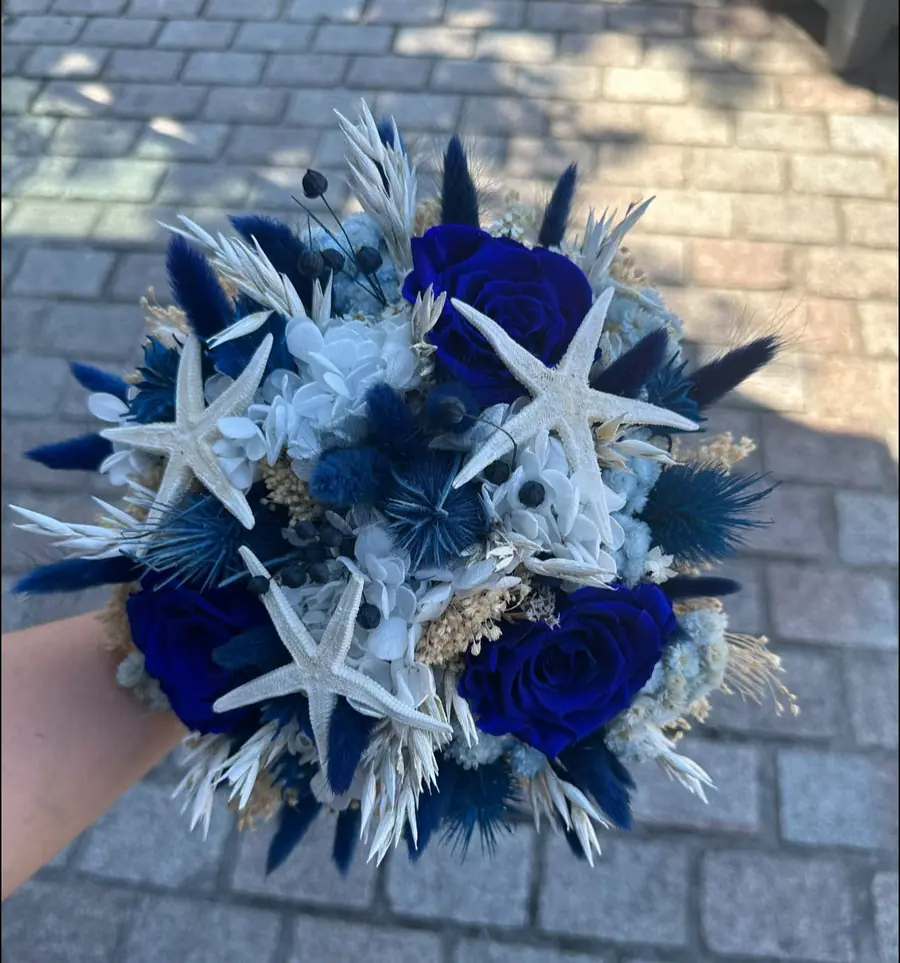 Décoration florale de mariage réalisée par MC Maison des Créations, fleuriste à Beuvrages