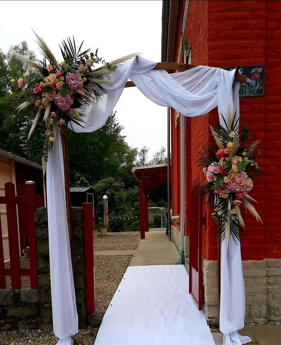 Décoration florale de mariage réalisée par MC Maison des Créations, fleuriste à Beuvrages