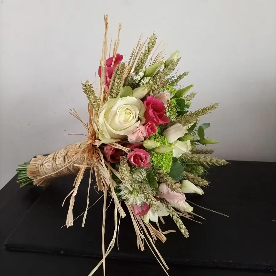 Décoration florale de mariage réalisée par MC Maison des Créations, fleuriste à Beuvrages