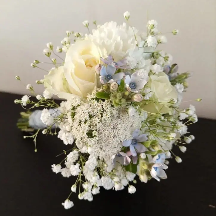 Décoration florale de mariage réalisée par MC Maison des Créations, fleuriste à Beuvrages