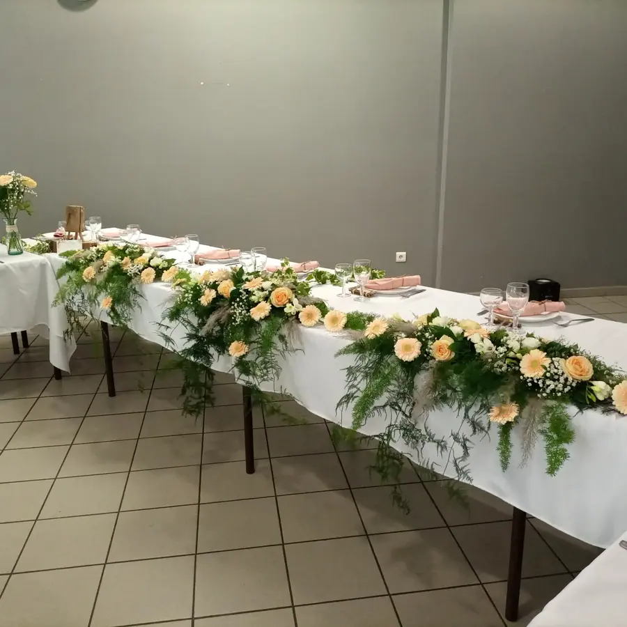 Décoration florale de mariage réalisée par MC Maison des Créations, fleuriste à Beuvrages
