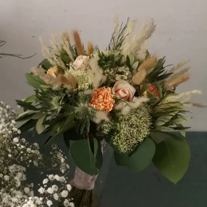 Décoration florale de mariage réalisée par MC Maison des Créations, fleuriste à Beuvrages