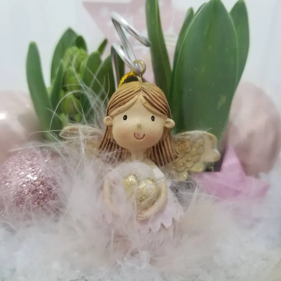 Décoration florale de Noël réalisée par MC Maison des Créations, fleuriste à Beuvrages
