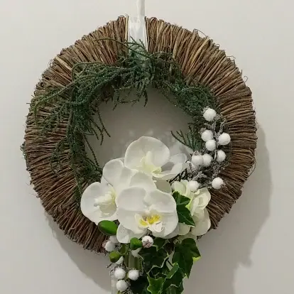 Décoration florale de Noël réalisée par MC Maison des Créations, fleuriste à Beuvrages