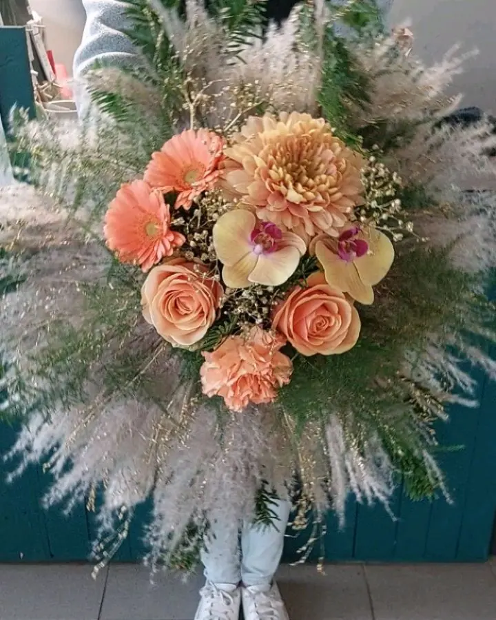 Composition en fleurs séchées réalisée par MC Maison des Créations, fleuriste à Beuvrages